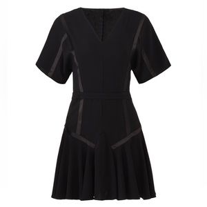 Black Halston dress, never worn (too small for me, oops!). Perfect condition.